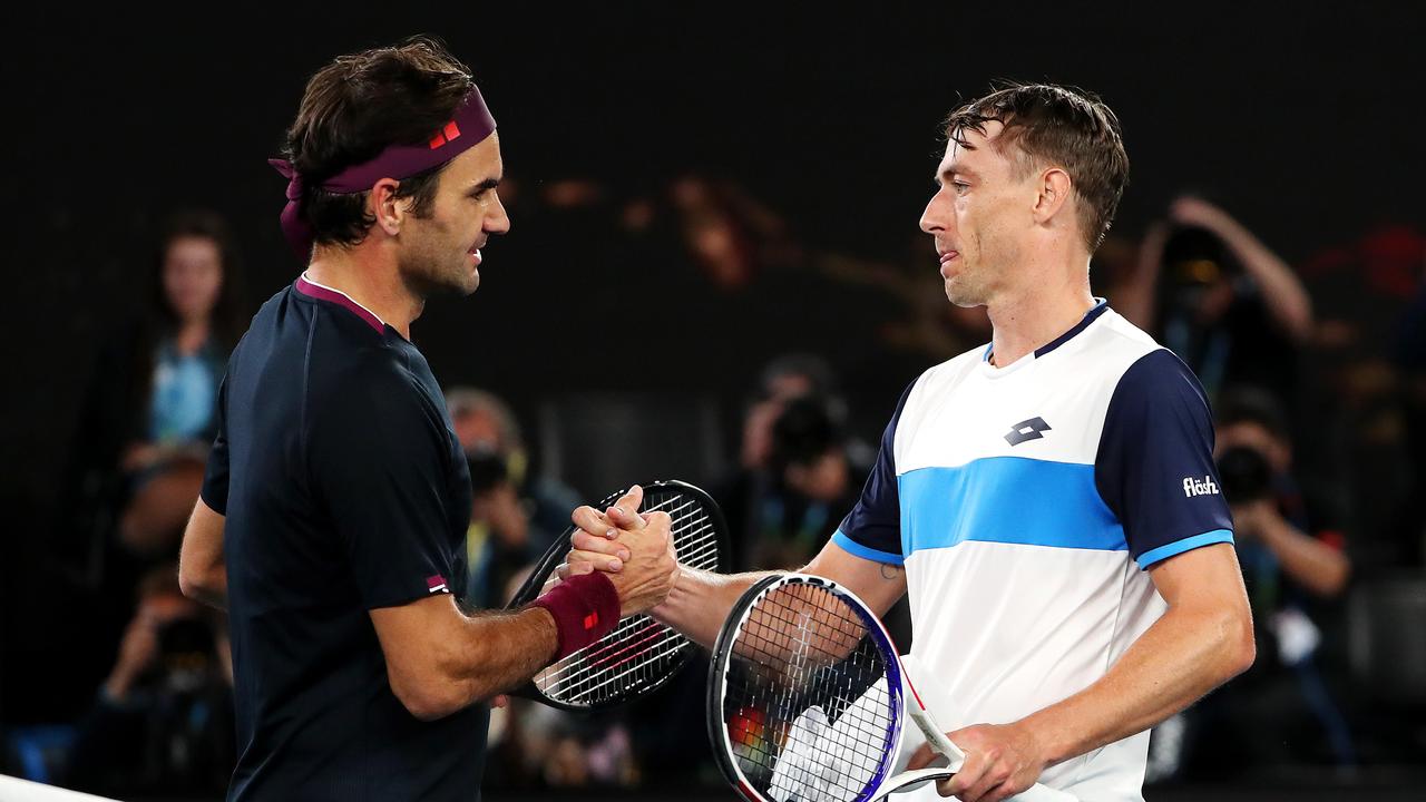 Roger Federer celebrates his win against Aussie John Millman and this year’s Australian Open. Picture: Mark Stewart