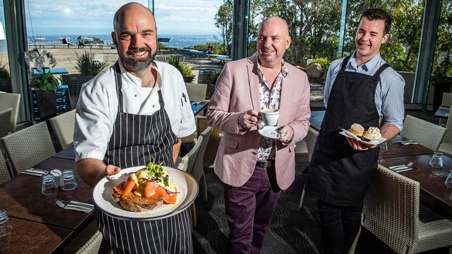 Mount Lofty Summit Cafe head chef Tom Samuel-White, owner Tony O'Donnell and front of house staff Andrew Norris. Picture: Tom Huntley