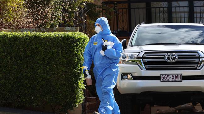 Cleaners at the crime scene following a horror home invasion. Picture: Tara Croser.