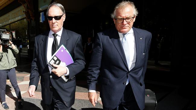 Robert Hughes and Greg Walsh outside court in 2014. Picture: Bradley Hunter