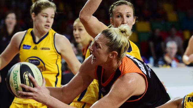 Flames players make life difficult for Fire star Suzy Batkovic.