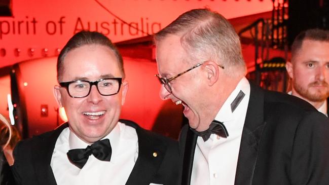 Anthony Albanese with former Qantas CEO Alan Joyce. The PM may be loudly explaining the exorbitant prices Mr Joyce set to price Australians out of using the national carrier.