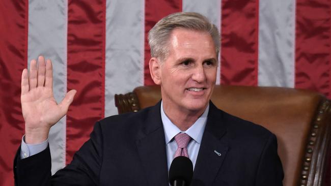 Kevin McCarthy takes the oath of office after he was elected speaker on the 15th ballot on Saturday. Picture: AFP