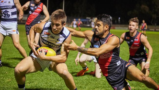 South Adelaide star Joel Cross was in the thick of the action against West Adelaide. Picture: Matt Loxton/AAP