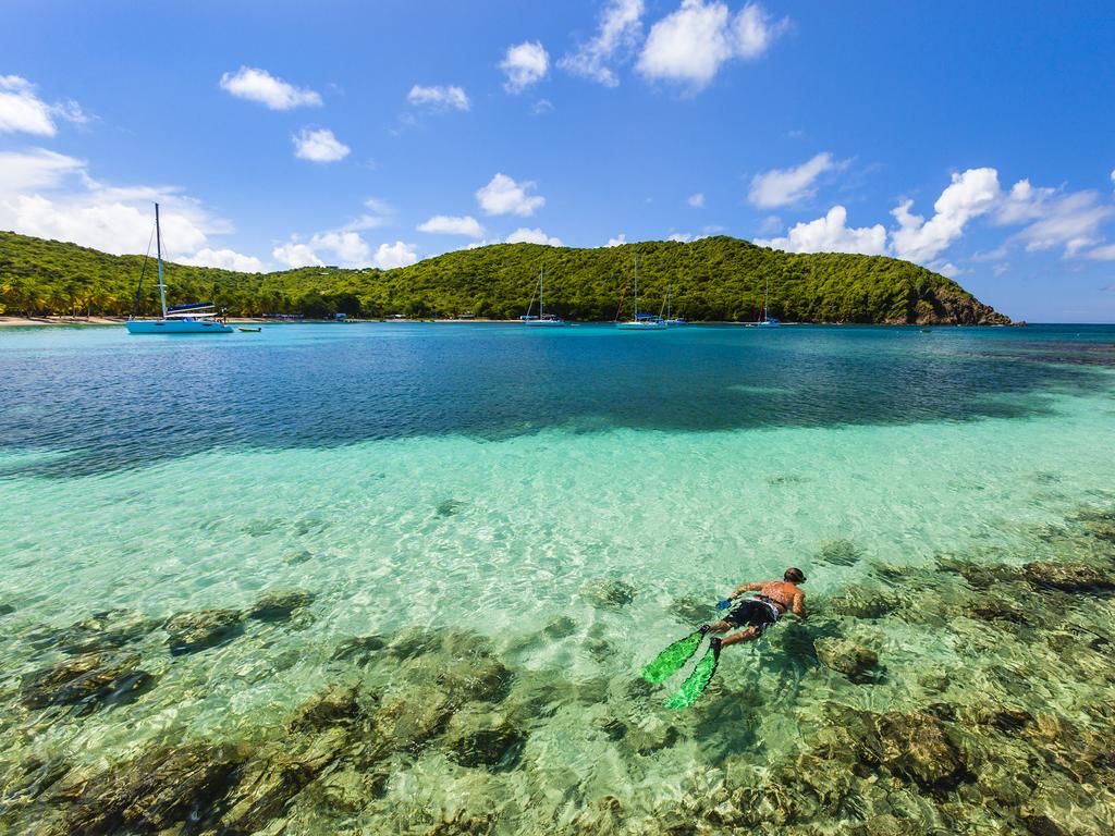 <p><b>THE GRENADINES</b> If sunbathing and snorkelling sounds like your ideal end of year getaway, head to the sunny Grenadines. For the first half of the month, the string of emerald islands are peaceful and calm. From mid-December, things get a little livelier &hellip;<b><br>PRO TIP:</b> In the lead up to Christmas, the Nine Mornings Festival takes place where locals awaken in the early hours of the morning and perform dances, sing in street concerts, ride bicycles through town and swim in the warm waters.<br><a href="https://www.escape.com.au/experiences/10-places-to-visit-to-make-you-smile/news-story/cb969e5c5940eebb42ac689cb4ee01ab" target="_blank" rel="noopener">THESE HOLIDAYS WILL HAVE YOU ACTING LIKE A CHILD</a></p>