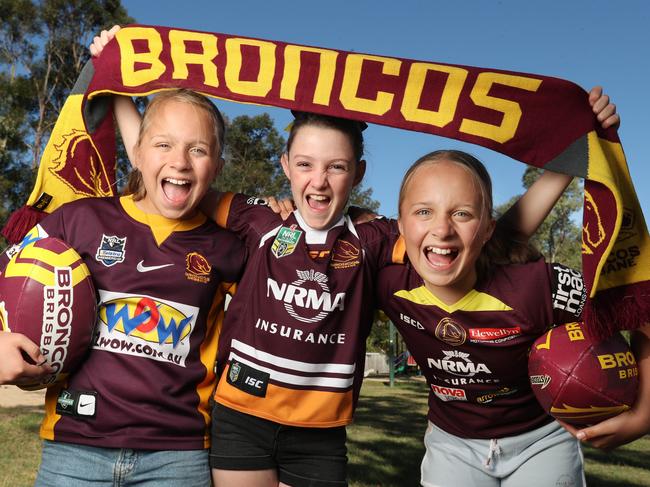 Broncos fans Emily Hickling, Madilyn Cox and Sarah Hickling, all 11. Picture: Annette Dew