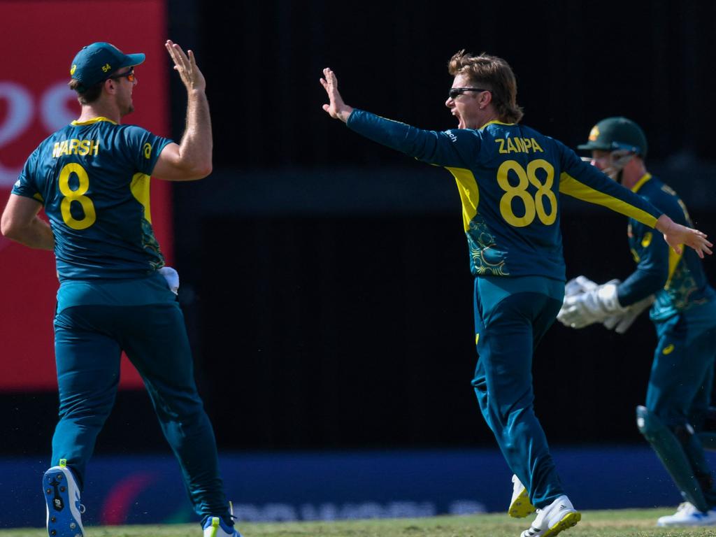 Adam Zampa celebrates the dismissal of Jos Buttler. Picture: Randy Brooks/AFP