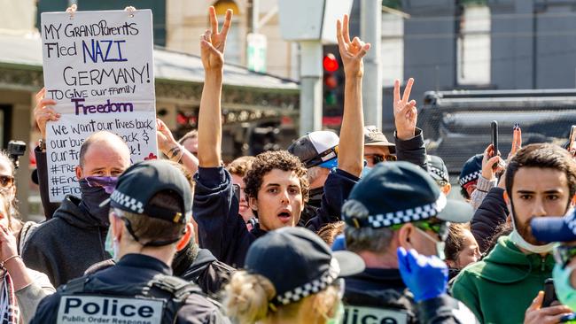 Anti-lockdown protests in Melbourne. A similar event has been proposed for Brisbane on Monday morning. Picture: Jake Nowakowski