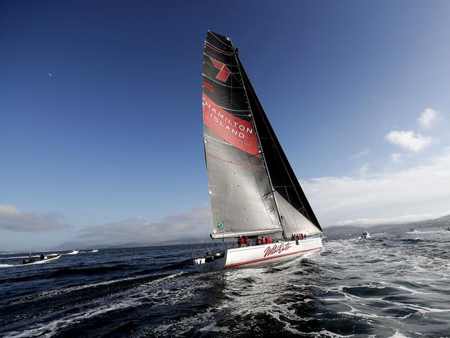 Wild Oats XI skippered by Mark Richards sails up the River Derwent on her way to a 9th line honours victory in the 2018 Sydney to Hobart Yacht Race. The yacht crossed the line in 1d 19hrs 7mins 21secs . Picture: RICHARD JUPE