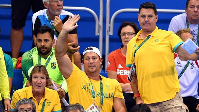 Australian swim coaches Denis Cotterell, left, Chris Mooney and Rohan Taylor react as Alicia Coutts swims at the 2016 Olympic Games in Rio. Picture: Dave Hunt/AAP