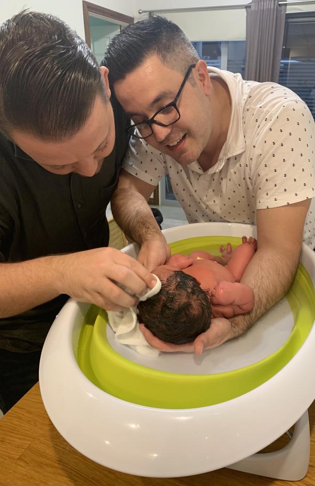 Baden and Nelson with newborn Amalia.