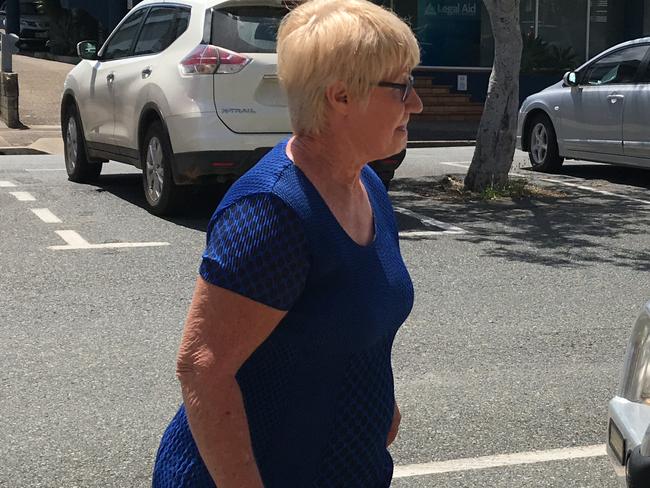 Elizabeth Anne Turner (blue dress), Mother of Mackay business-turned-fugitive Markis Scott Turner, is charged with attempting to pervert the course of justice and giving false testimony. Photo: Janessa Ekert