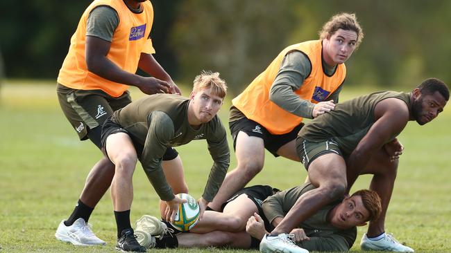 Tate McDermott passes during a Wallabies training session at Sanctuary Cove on June 29, 2021 in Gold Coast, Australia. (Photo by Chris Hyde/Getty Images)