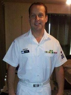 Dan Herps stands proudly in his Royal Australian Navy uniform in 2012.