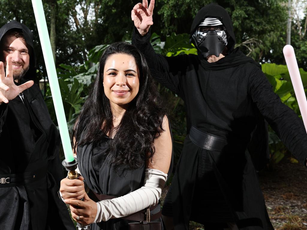 May the 4 be with you also has a serious side as the buzz of the lightsabre helps Star Wars enthusiasts focus and relax says anaesthetist Dr Vesslin Petkov (right) with colleagues Martin Ogrodzinski, Sophiya Ogrodzinski. Picture: Brendan Radke