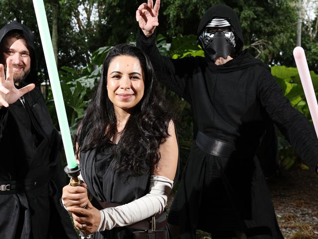 May the 4 be with you also has a serious side as the buzz of the lightsabre helps Star Wars enthusiasts focus and relax says anaesthetist Dr Vesslin Petkov (right) with colleagues Martin Ogrodzinski, Sophiya Ogrodzinski. Picture: Brendan Radke