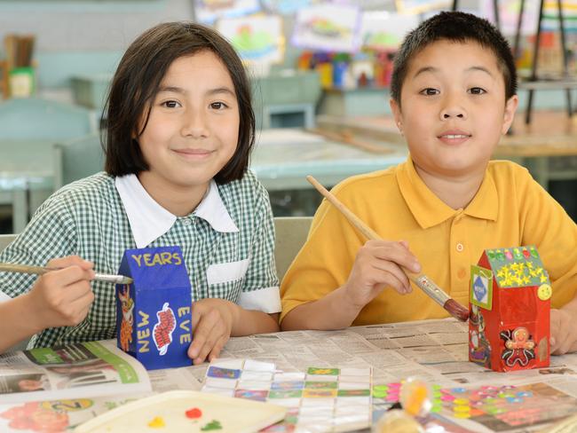 Anh, 10 and Adrian, 9, from Stevensville Primary School take part in an Arts Centre project called Home. Picture: Kris Reichl