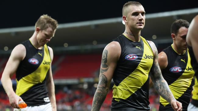 Dejected Richmond players Dustin Martin and Jack Riewoldt leave the field after going down to the Giants at Spotless Stadium. Picture: Phil Hillyard