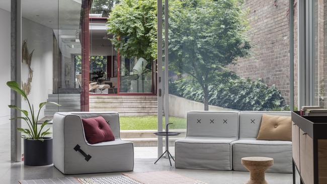 Lightweight furniture in the media room is flexible enough to be moved outdoors Pictures: Nicholas Watt