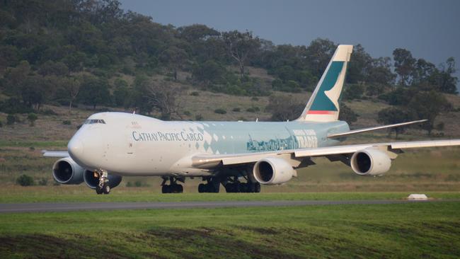 Cathay Pacific 747-8 jumbo cargo plane leaves Wellcamp Airport. Photo Will Hunter