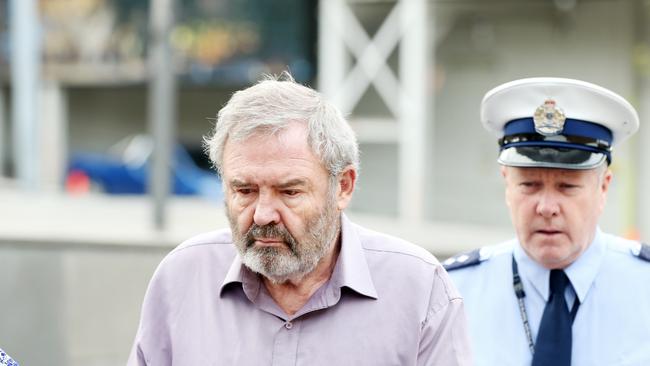 Klaus Dieter Neubert is taken into the Supreme Court of Tasmania for sentencing for the murder of his estranged wife Olga Neubert at Risdon Rd in 2015. Picture: PATRICK GEE