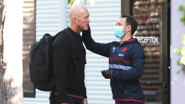 Roosters assistant coach Craig Fitzgibbon has his temperature checked while arriving at Sydney Roosters headquarters. Picture: Getty Images.