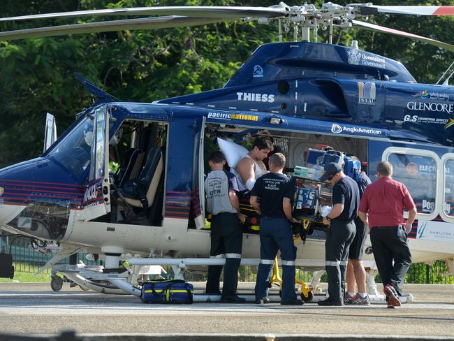 RACQ CQ Rescue helicopter landing at the Mackay Base Hospital with patients from Hamilton Island. Picture: Tony Martin