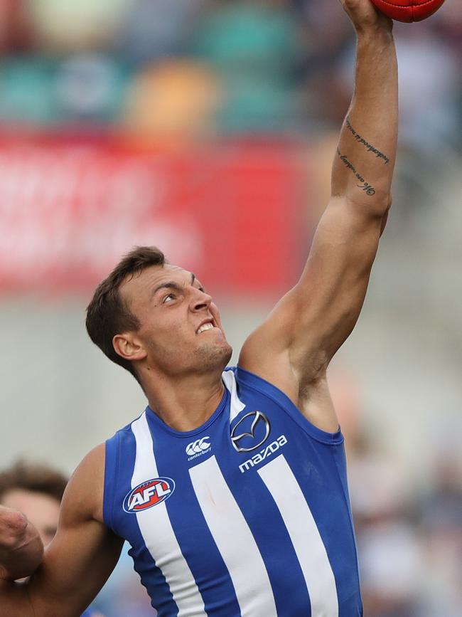 Preuss is behind Todd Goldstein at the Roos. Pic: Getty Images