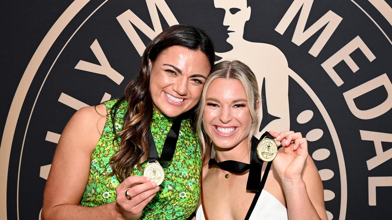 BRISBANE, AUSTRALIA - APRIL 07: Millie Boyle of the Broncos and Emma Tonegato of the Dragons celebrate after winning the Dally M Medal Award for Player of the Year during the 2021 NRLW Awards at Rivershed on April 07, 2022 in Brisbane, Australia. (Photo by Bradley Kanaris/Getty Images)