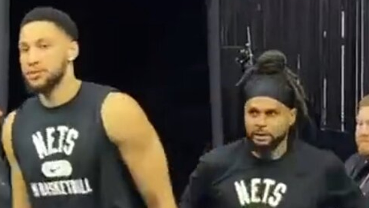 Patty Mills stands right behind Simmons in his return to Philadelphia.