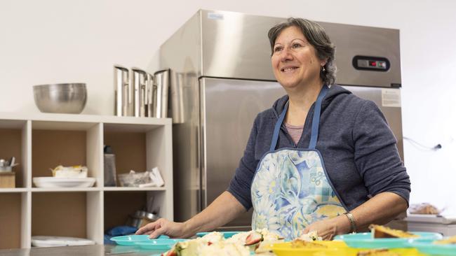 Salvation Army volunteer Connie Gonez prepares the Salvos Maroubra community lunch. Picture: Matthew Vasilescu