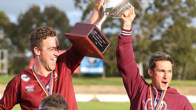 Former PAOC coach Brett Backwell (right) with Tom Brinsley after the Old Reds won the 2016 Adelaide Footy League division one grand final. Backwell will coach against PAOC in 2021 after being appointed Brighton's’s new mentor. Picture: Stephen Laffer