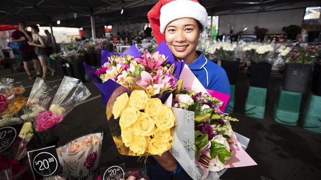 Jonalyn Macaraig from Festive Fresh Market posing at Flower Lovers at Festive Fresh Market at 385 Sherwood Rd.