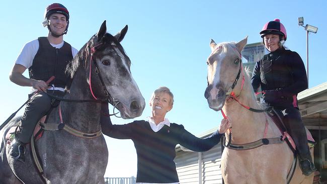 Gillian Heinrich was all smiles when she returned to the track after her treatment in 2015. She pictured with her now co-trainer Ben Rodgers (left) and Maggie Harrison. Picture: Richard Gosling