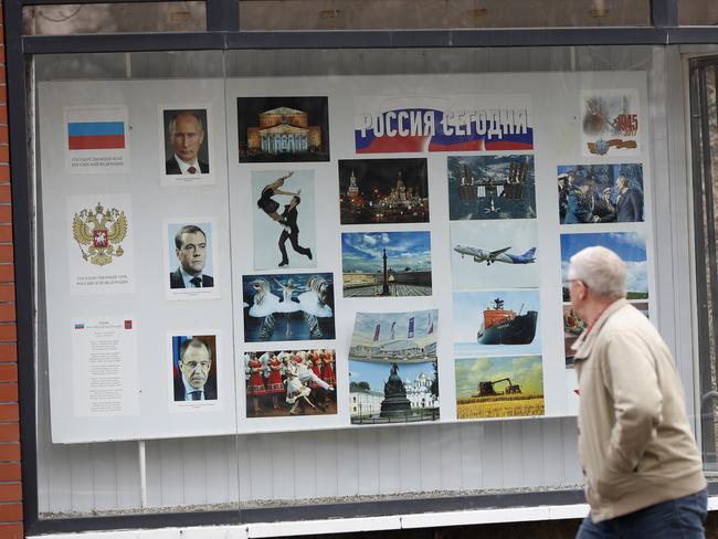 A man walks past the Russian embassy in the Czech Republic. The country is expelling three staffers from its Russian embassy. Picture: AP/Petr David Josek