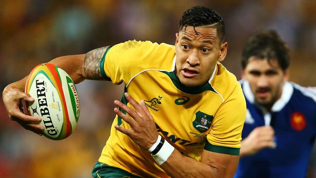 BRISBANE, AUSTRALIA - JUNE 07: Israel Folau of the Wallabies makes a line break during the First International Test Match between the Australian Wallabies and France at Suncorp Stadium on June 7, 2014 in Brisbane, Australia. (Photo by Mark Nolan/Getty Images)