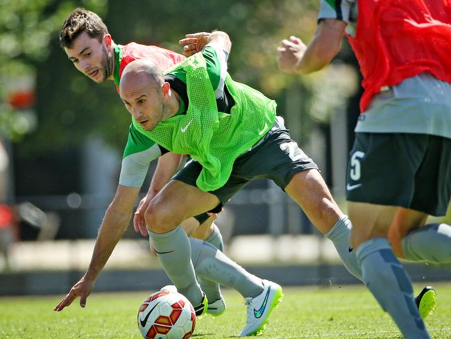 Mark Bresciano shows the youngster how it’s done.