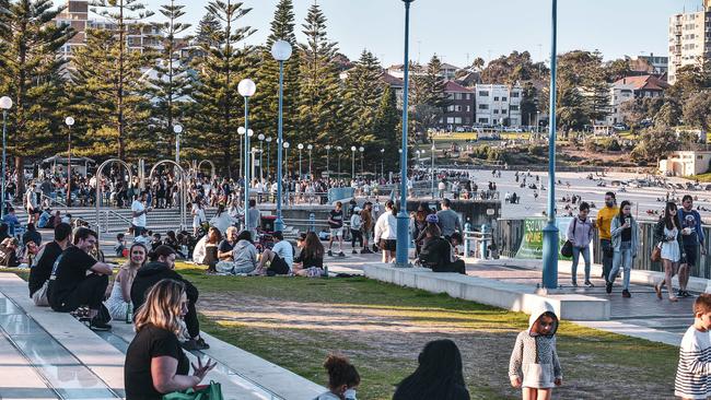 People flocked to Coogee Beach on Sunday to make the most of the hot weather. Picture: Flavio Brancaleone