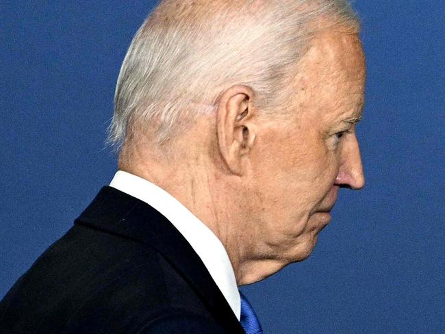 TOPSHOT - US President Joe Biden leaves after speaking at a Ukraine Compact initiative on the sidelines of the NATO Summit at the Walter E. Washington Convention Center in Washington, DC, on July 11, 2024. (Photo by Brendan SMIALOWSKI / AFP)