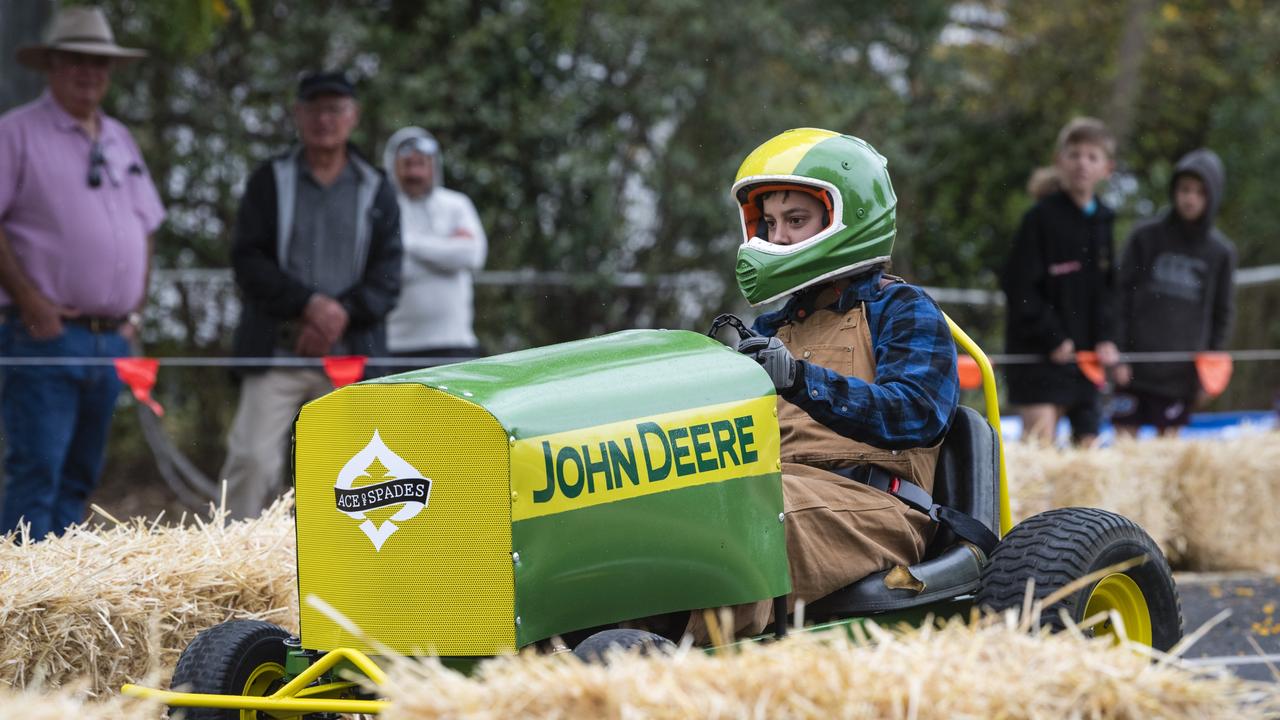 Ace Fallon steers his John Deere inspired entry down the track at the Greenmount Billy Cart Challenge, Saturday, November 25, 2023. Picture: Kevin Farmer