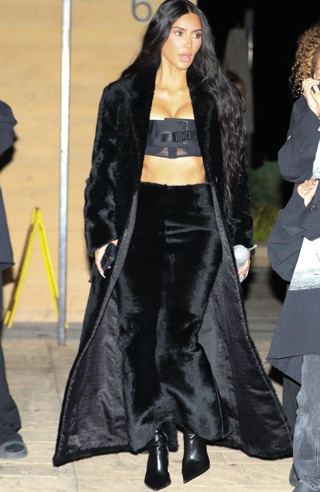 Also this week, Kim Kardashian and Kanye West reunited for dinner at Nobu Malibu with their children for their daughter North West’s dinner party. Kim showed off her abs in a super cropped tube top, paired with a velvet trench coat and patent leather boots.