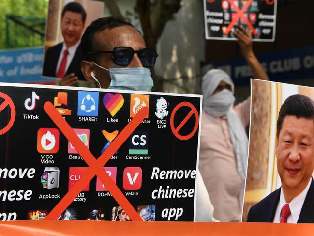 Members of the Working Journalist of India hold placards urging citizens to remove Chinese apps and stop using Chinese products during a demonstration against the Chinese newspaper Global Times, in New Delhi. Picture: AFP