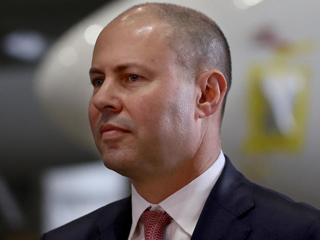 SYDNEY, AUSTRALIA - NewsWire Photos MARCH 11, 2021: Pictured Treasurer Josh Frydenberg in front of a Boeing 737 at Qantas Hangar 96 at Sydney Airport in Sydney NSW. Picture: NCA NewsWire / Dylan Coker