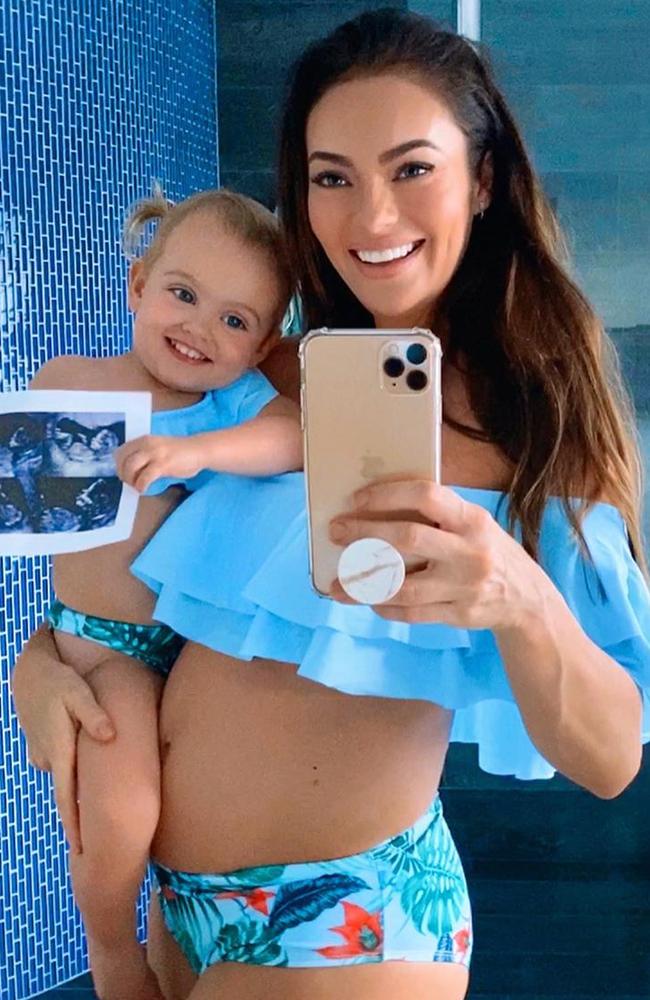 Emily with her daughter Mia, revealed she is pregnant again after trying to conceive for a year. Picture: Instagram/emilyskyefit