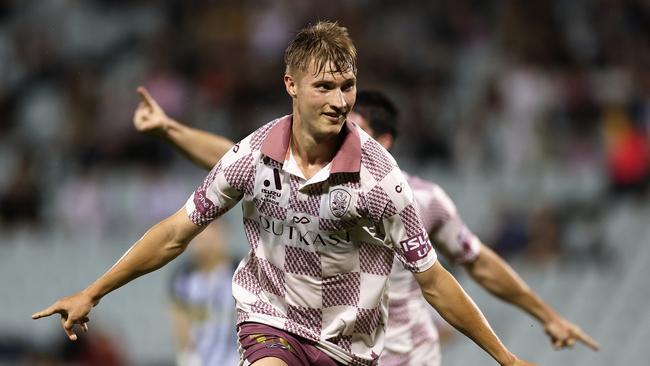 Thomas Waddingham of the Roar celebrates scoring a goal during the round six A-League Men match between Macarthur FC and Brisbane Roar at Campbelltown Stadium, on November 30, 2024, in Sydney, Australia. (Photo by Cameron Spencer/Getty Images)