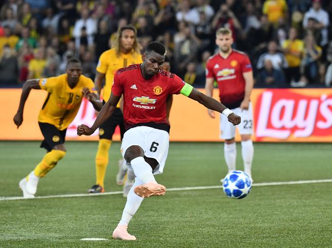 Manchester United's French midfielder Paul Pogba scores a penalty during the UEFA Champions League group H football match between Young Boys and Manchester United at The Stade de Suisse in Bern on September 19, 2018. (Photo by Alain GROSCLAUDE / AFP)