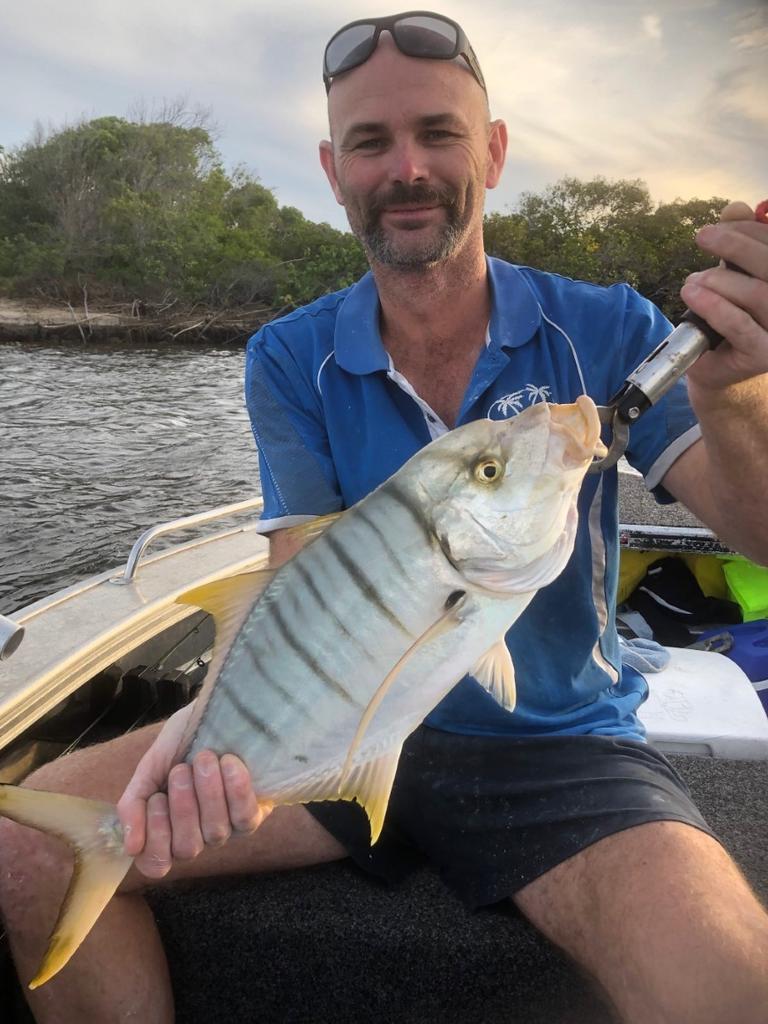 Chad Harper shows off a nice Golden Trevally he nailed on a recent trip out on the water.