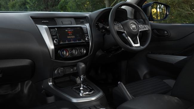 The Nissan Navara SL Warrior is basic with vinyl floors, but at least it has an eight-inch touchscreen with Apple CarPlay and Android Auto apps, while the driver also has a seven-inch digital readout.