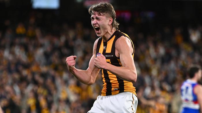 MELBOURNE, AUSTRALIA - SEPTEMBER 06: Calsher Dear of the Hawks celebrates kicking a goal during the AFL Second Elimination Final match between Western Bulldogs and Hawthorn Hawks at Melbourne Cricket Ground, on September 06, 2024, in Melbourne, Australia. (Photo by Quinn Rooney/Getty Images)