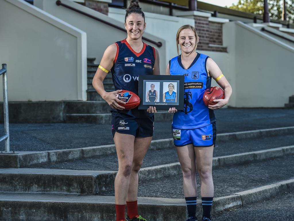 SANFL Women's teams Sturt and Norwood will honour SANFLW player Ellen Maple who was tragically killed in a car accident last year. Leah Cutting (Norwood Capt.) with Caitlyn Swanson (Sturt Capt.)10th April 2019. Pic. AAP/Roy VanDerVegt